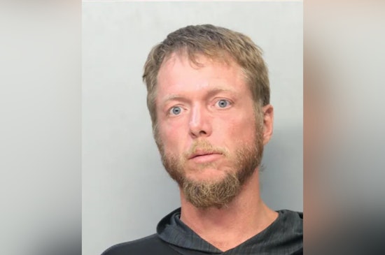 Homestead Man Charged After Allegedly Stealing Police Car Post-Crash, Leading to Arrest at JD Redd Park