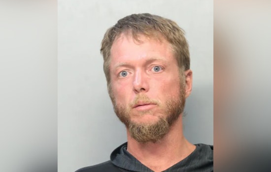 Homestead Man Charged After Allegedly Stealing Police Car Post-Crash, Leading to Arrest at JD Redd Park
