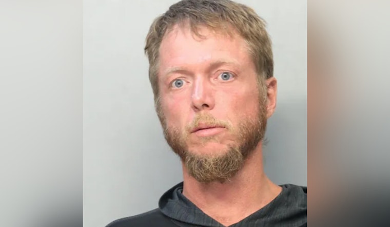 Homestead Man Charged After Allegedly Stealing Police Car Post-Crash, Leading to Arrest at JD Redd Park