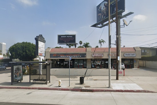 Los Angeles Firefighters Subdue Mid-Wilshire Strip Mall Blaze After Roof Collapse