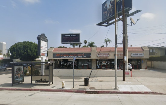 Los Angeles Firefighters Subdue Mid-Wilshire Strip Mall Blaze After Roof Collapse