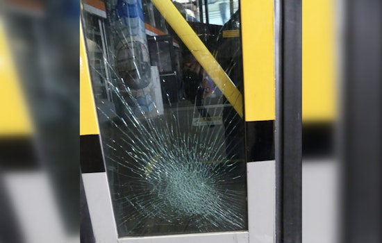 Man Vandalizes MBTA Bus in Jackson Square, Prompting Investigation and Transit Delays