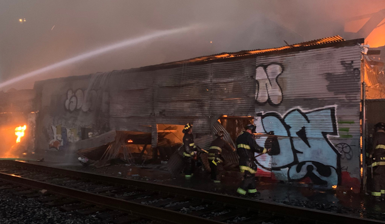 Oakland Firefighters Tackle Intense Four-Alarm Blaze at Economy Lumber Yard