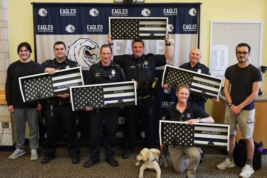 Plymouth North High School Students Honor School Officers with Handcrafted Vest Racks