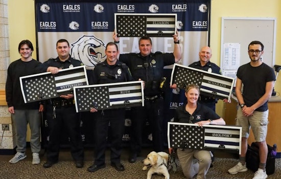 Plymouth North High School Students Honor School Officers with Handcrafted Vest Racks