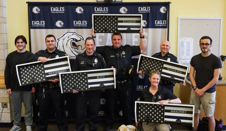 Plymouth North High School Students Honor School Officers with Handcrafted Vest Racks