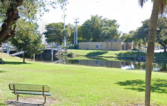 SUV Plunges into Miami Lakes Canal, Driver Hospitalized with Unknown Condition