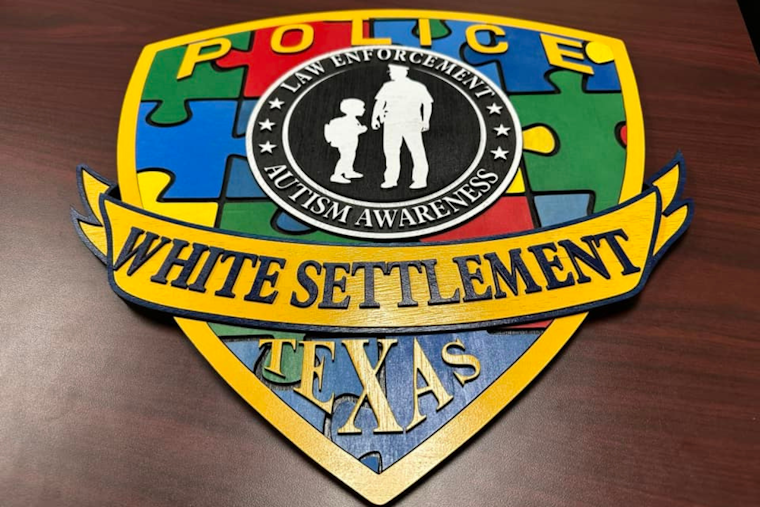 White Settlement Police Department Honors Autism Awareness with Custom Wood Plaque Crafted by Local Artisans