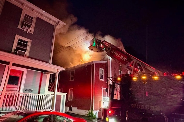 Young Girl Rescued from Rooftop by Brave Firefighters Amidst Woburn House Inferno