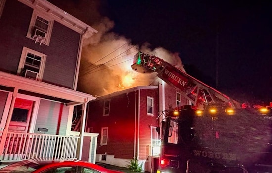 Young Girl Rescued from Rooftop by Brave Firefighters Amidst Woburn House Inferno
