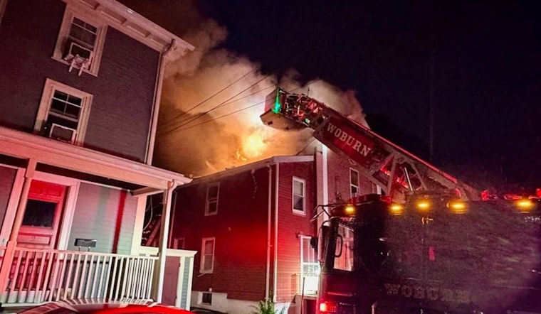 Young Girl Rescued from Rooftop by Brave Firefighters Amidst Woburn House Inferno