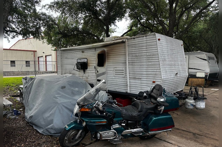 Houston Community Mourns as Fire Claims Life in Travel Trailer Blaze, Arson Investigation Underway