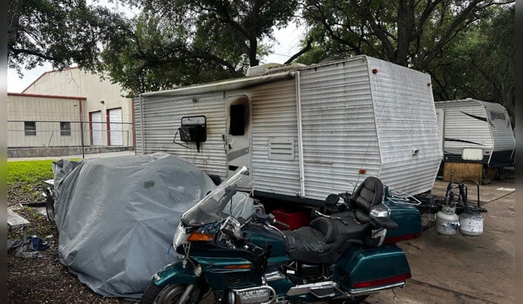 Houston Community Mourns as Fire Claims Life in Travel Trailer Blaze, Arson Investigation Underway