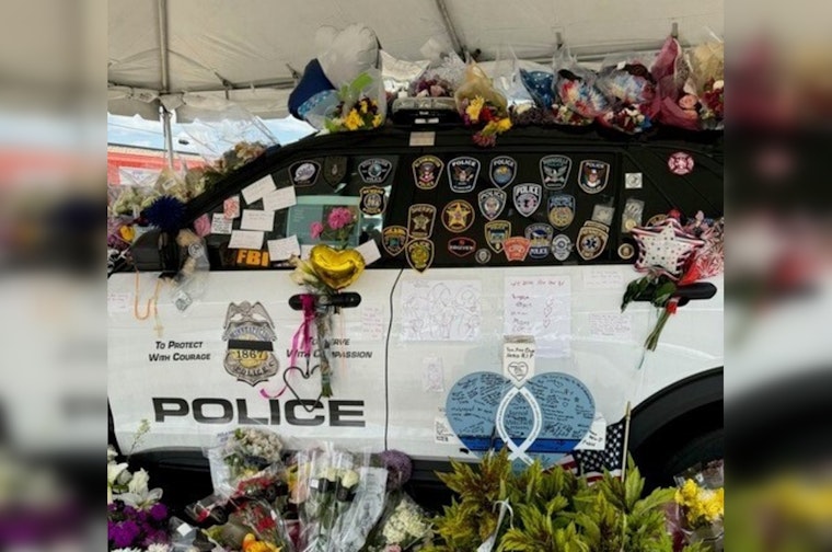 Minneapolis Community Honors Fallen Officer Jamal Mitchell with Growing Memorial at Fifth Precinct