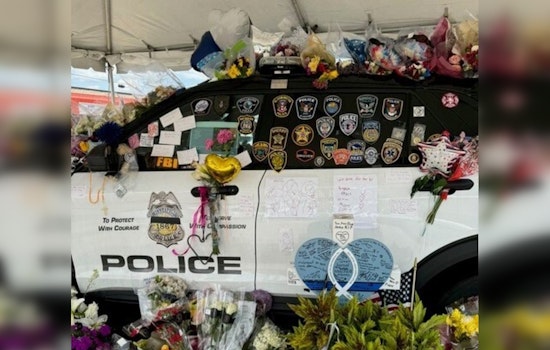 Minneapolis Community Honors Fallen Officer Jamal Mitchell with Growing Memorial at Fifth Precinct