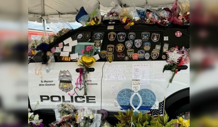 Minneapolis Community Honors Fallen Officer Jamal Mitchell with Growing Memorial at Fifth Precinct