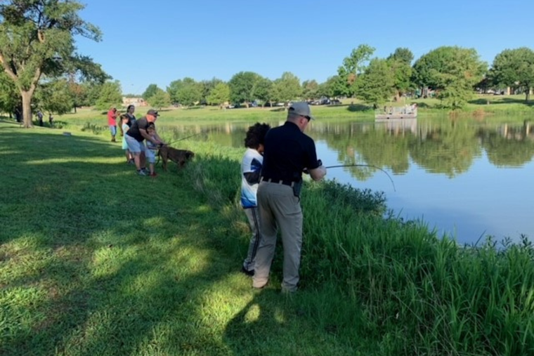 Plano Police Officers Bond with Local Youth Through Fishing Outreach Program