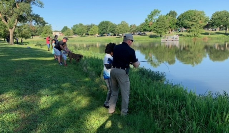 Plano Police Officers Bond with Local Youth Through Fishing Outreach Program
