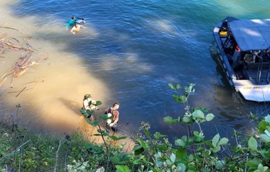 Search Suspended as Driver Remains Missing in Foster Lake Car Plunge, Authorities Await Dive Team