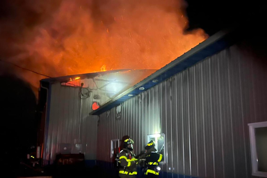 Sheridan Auto Repair Shop Engulfed in Flames, Community Effort Extinguishes Blaze with No Injuries Reported