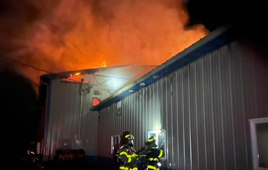 Sheridan Auto Repair Shop Engulfed in Flames, Community Effort Extinguishes Blaze with No Injuries Reported