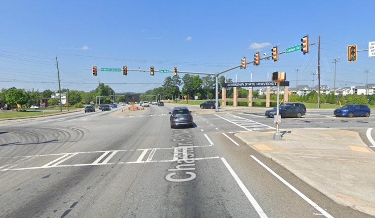 Three Injured in Cobb County After Motorcycle Runs Red Light and Collides with Car