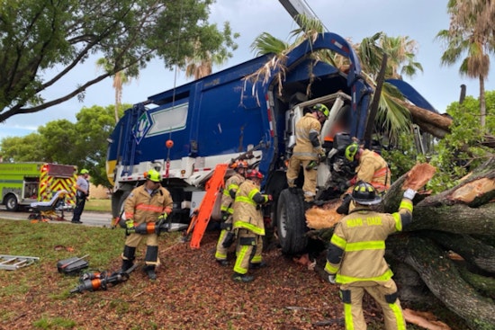 Two Hospitalized After Medical Emergency Leads to Garbage Truck Crashing into Tree in SW Miami-Dade
