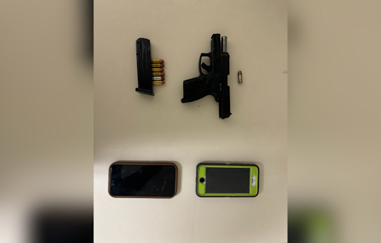 Baltimore Police Arrest Two Individuals and Confiscate Loaded Firearm in Stolen Vehicle Case