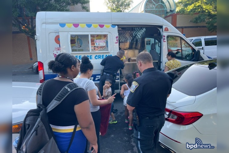 Boston Police Light Up Roslindale with Hot Dog Night and Community Flashlight Walk