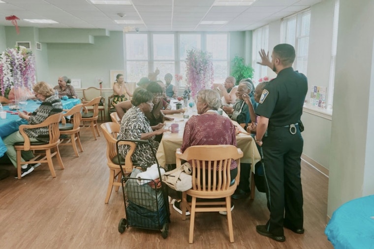 Boston Police Officers Forge Community Bonds Over Coffee at Spencer House