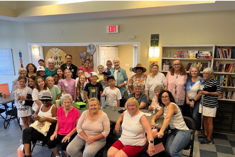 Boston Police Partner With Youth and Seniors for Intergenerational Pictionary Game in North End Community Event