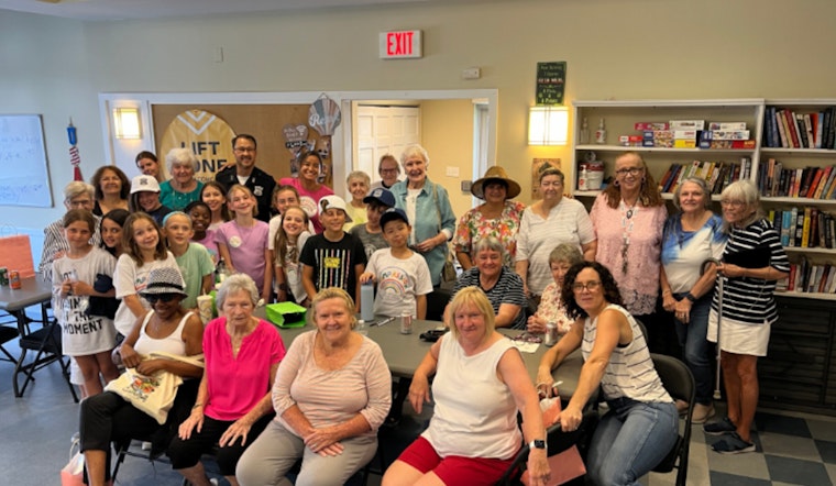 Boston Police Partner With Youth and Seniors for Intergenerational Pictionary Game in North End Community Event