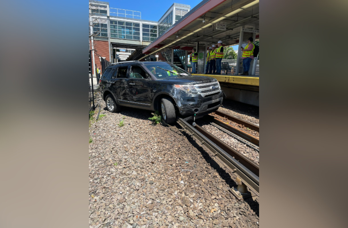 Driver Charged After Crashing Car onto MBTA Train Tracks, Disrupting