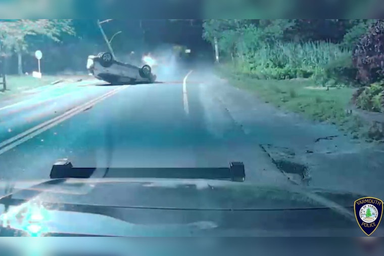 Driver Charged with OUI After Vehicle Flips on Route 28 in Yarmouth, Prompting Road Closure and Power Outage