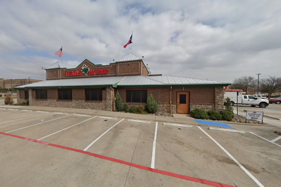 Garland Police Serve Meals for a Cause at "Tip-A-Cop" Event Supporting Special Olympics Texas