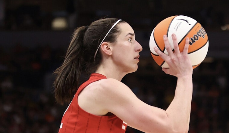 Indiana Fever’s Caitlin Clark Delights Fan with Surprise Photobomb Featuring Jake from State Farm in Phoenix