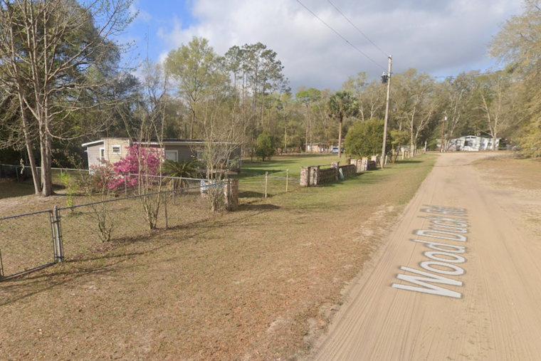 Man Found Dead with Gunshot Wound After House Fire in Lake County, Death Investigation Underway