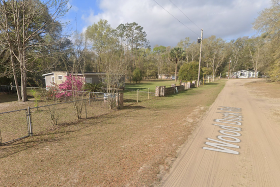 Man Found Dead with Gunshot Wound After House Fire in Lake County, Death Investigation Underway