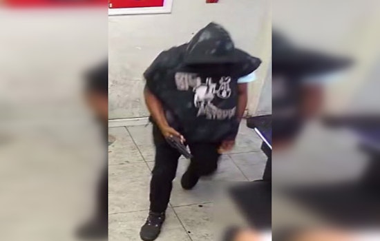 Philadelphia Police Seek Public's Aid to Identify Suspect in Kensington Avenue Shooting and Robbery