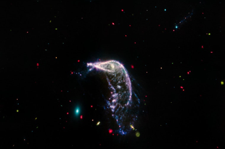 Webb Telescope Snaps Dazzling Duo in Deep Space: "The Penguin and the Egg" Dance Captured in New Cosmic Images