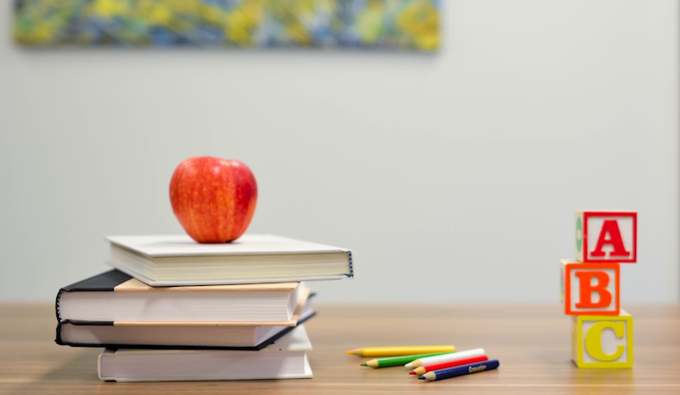 Assistance League of Phoenix Equips Over 15,000 Kids for School with Delivering Dreams Buses Program