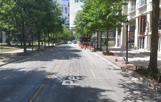 Atlanta Police Officer Exchanges Gunfire with Suspect Following Domestic Dispute on Peachtree Street