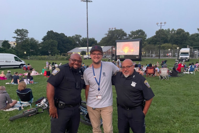 Boston Police and Residents Bond Over Outdoor Movie Night at Healy Field