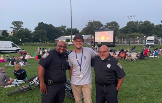 Boston Police and Residents Bond Over Outdoor Movie Night at Healy Field