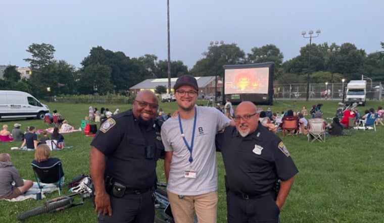 Boston Police and Residents Bond Over Outdoor Movie Night at Healy Field
