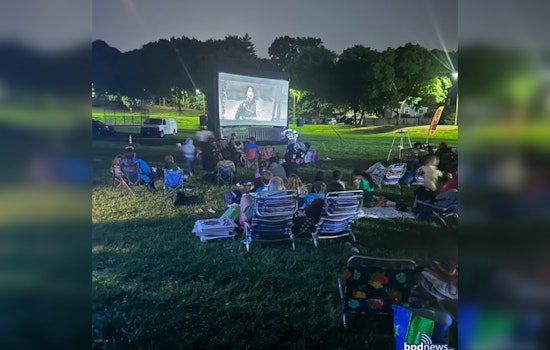 Boston Police Department Bonds with West Roxbury Community at Outdoor "Willy Wonka" Movie Night