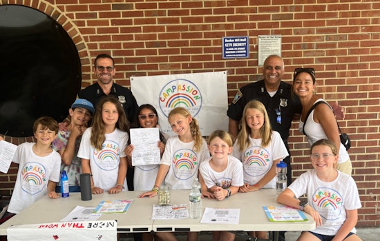 Boston's Community and Police Unite at Compassion Camp in Charlestown Mall to Strengthen Ties and Foster Service