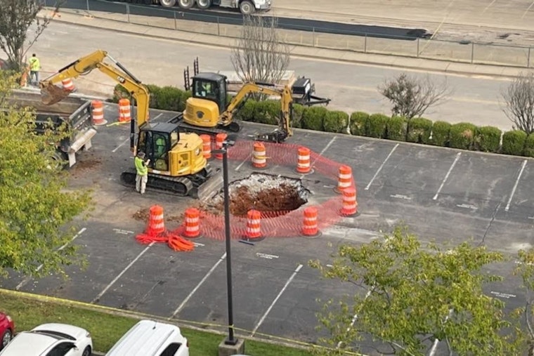 Construction Truck Reveals Historic Cistern After Sinking Into Clarksville City Hall Parking Lot Sinkhole