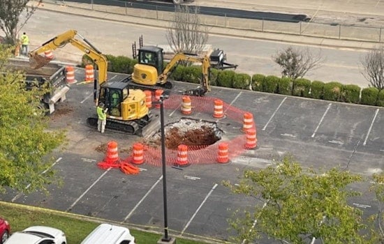 Construction Truck Reveals Historic Cistern After Sinking Into Clarksville City Hall Parking Lot Sinkhole