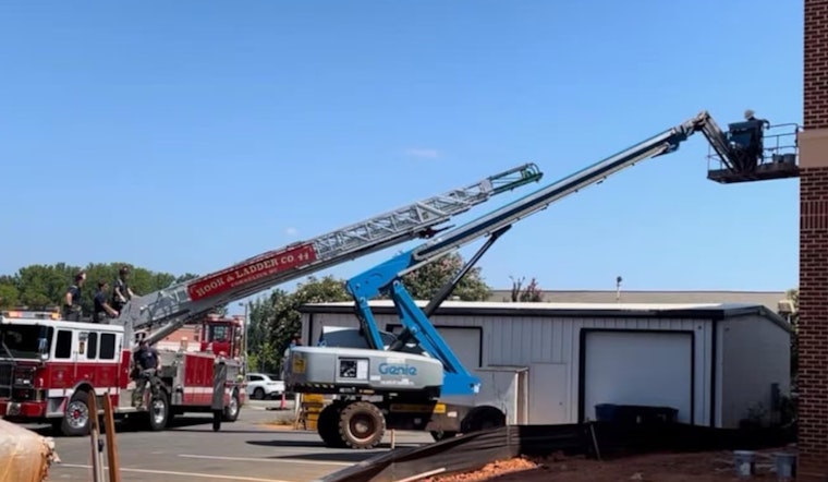 Cornelius Firefighters Swiftly Rescue Worker Stuck in Mid-Air Lift